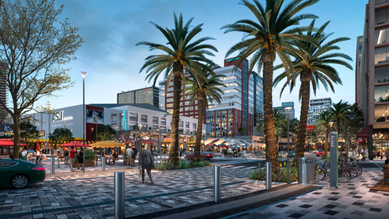 Evening street view of Novus Place looking towards ASU campus with people walking through the streets